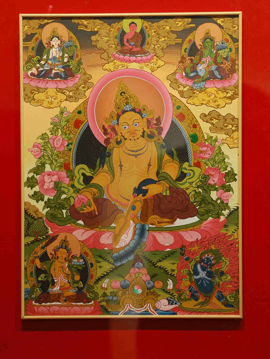 Hand-Painted Yellow Jambhala Thangka: Tibet’s "Wealth Support Art" — Hang Endless Treasures in Your Home When a thangka is thoughtfully hung in your living room, it’s n