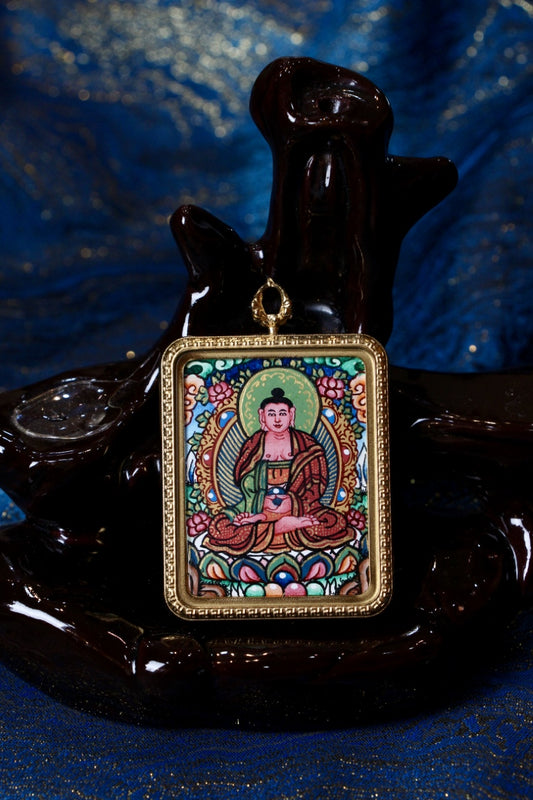 Amitabha Buddha Thangka Pendant in Tibetan Buddhist culture, symbolizing peace and enlightenment.