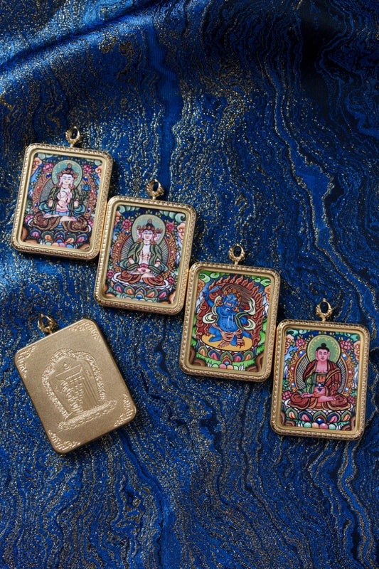 Artwork of an Amitabha Buddha Pendant, representing compassion and the Pure Land in Tibetan Buddhism.