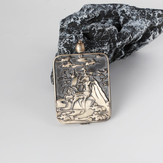 A 3.5x4.5cm hand-painted Rebgong Palden Lhamo Thangka pendant featuring the Sacred Protector Goddess of Wealth, encased in titanium steel, representing protection and prosperity in Tibetan Buddhist tradition.