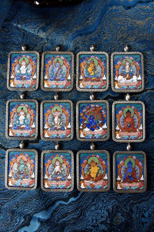 A 3.5x4.5cm portable White Tara Thangka shrine necklace, symbolizing health, family harmony, and long life.