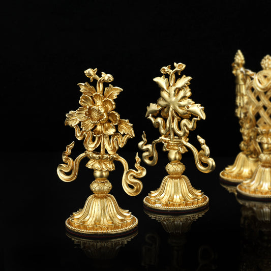 Miniature gold brass Eight Auspicious Symbols set, perfect for ritual use and meditation, reflecting Tibetan Buddhist ritual implements art.