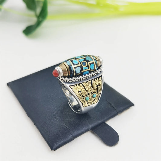 Handmade 925 silver Nine-Eyed spinning ring, a symbol of supreme merit in Tibetan Buddhist Jewelry Culture and jewelry art.