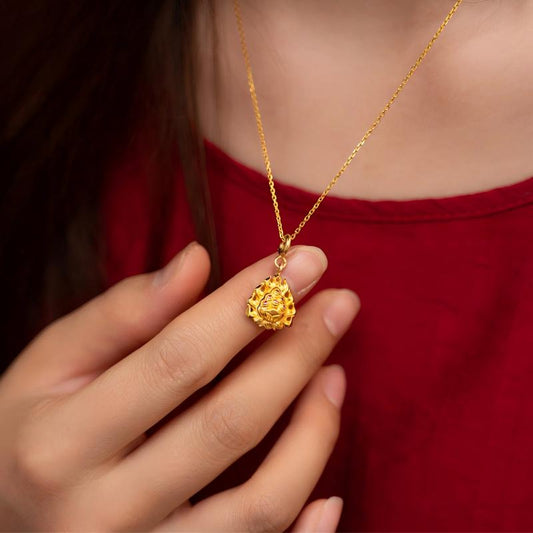 Hand-polished silver Cintamani (Cintamani) pendant featuring turquoise and coral, showcasing Tibetan-Buddhist Jewelry Culture.