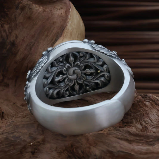 Intricate hand-carved King of Birds ring, showcasing artisan jewelry art inspired by Tibetan Buddhist Jewelry Culture.