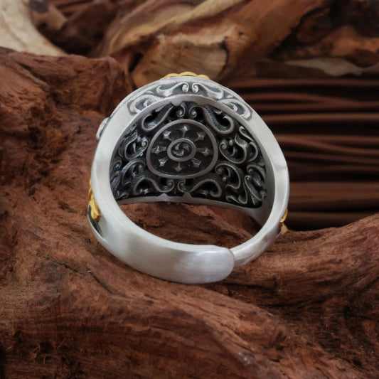Intricate hand-carved Wisdom Eye Dorje ring, showcasing artisan jewelry art inspired by Tibetan Buddhist Jewelry Culture traditions.