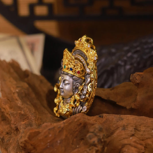 This handcrafted silver pendant showcases the Manjushri Bodhisattva, the protector of wisdom, beautifully crafted with silver and zircon. Drawing inspiration from Tibetan Buddhist Jewelry Culture, this pendant is a testament to traditional craftsmanship and spiritual artistry, perfect for those seeking a unique piece of jewelry with deep meaning.