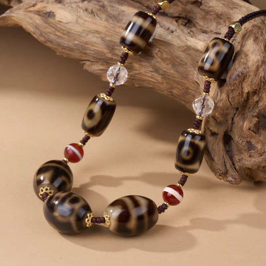 Tibetan Buddhist Jewelry Culture ivory yellow Darlok multi-totem Dzi bead clavicle necklace. A beautiful piece of jewelry art in natural agate.