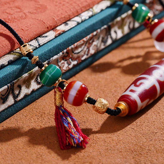 Tibetan Buddhist Jewelry Culture red meat agate clavicle necklace with Lotus Guru Rinpoche and ritual implements. A masterpiece of jewelry art.