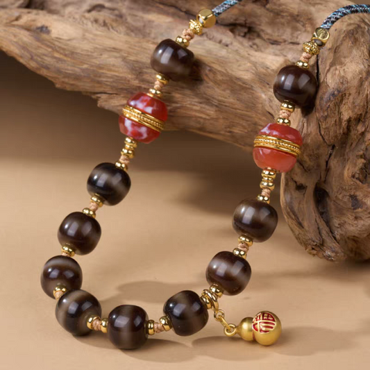 Tibetan Buddhist Jewelry Culture natural agate necklace with a single line Medicine Buddha Dzi bead. A high-vibrational piece of jewelry art for healing.