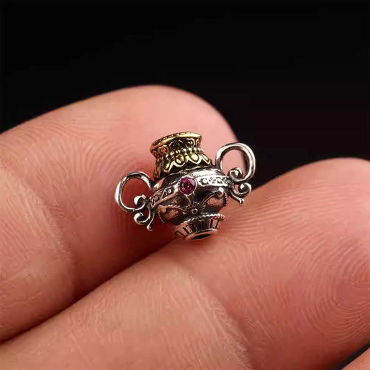 Tibetan Buddhist Jewelry Culture Vajra and Star-Moon Bodhi seed accessory with Passion Fruit accents. A sacred piece of jewelry art. Source