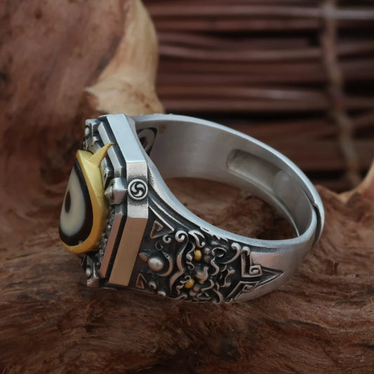 Treasury Rat (Mongoose) hand-carved ring, a spiritual piece of artisan jewelry art within Tibetan Buddhist Jewelry Culture.