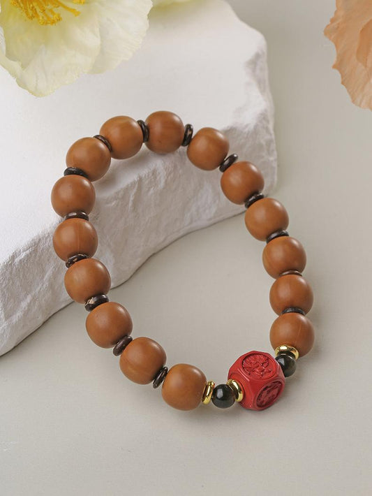Tibetan Buddhist Jewelry Art: Hand-Painted Cinnabar Monkey Head Beads Bracelet for spiritual protection and wisdom in Tibetan Buddhist tradition