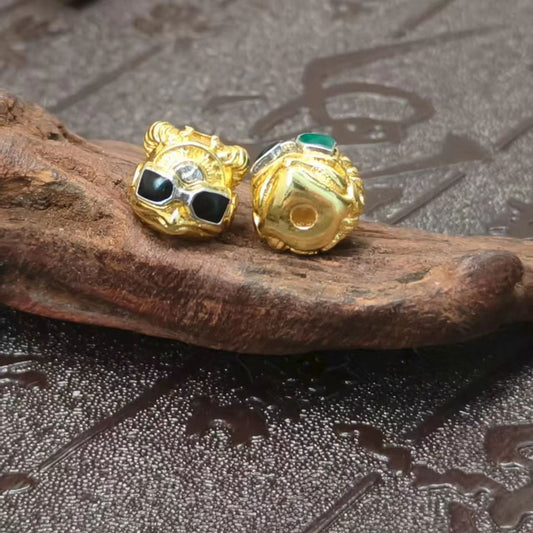 Handcrafted and hand-painted copper Garuda bead accessory, inspired by Tibetan Buddhist Jewelry Culture, perfect for bracelets, necklaces, or waist chains.