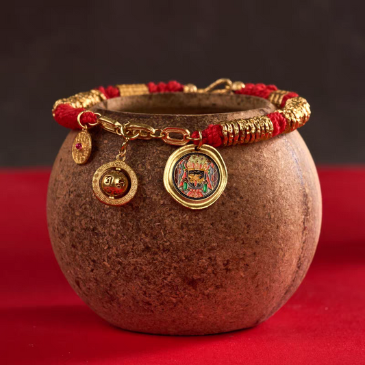 Handcrafted Zakiram wrapped bracelet with red thread, inspired by Tibetan Buddhist Jewelry Culture, a lucky and protective handmade jewelry art piece.