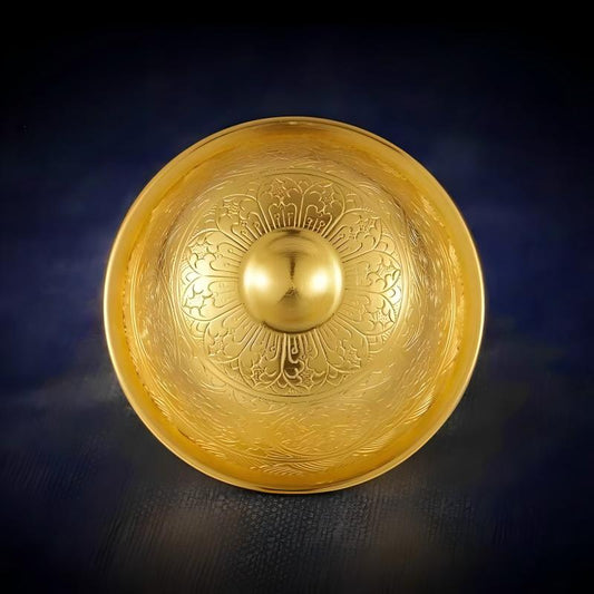 Intricate hand-carved Tibetan offering cup, showcasing artisan jewelry art inspired by the sacred traditions of Tibetan Buddhist Jewelry Culture.