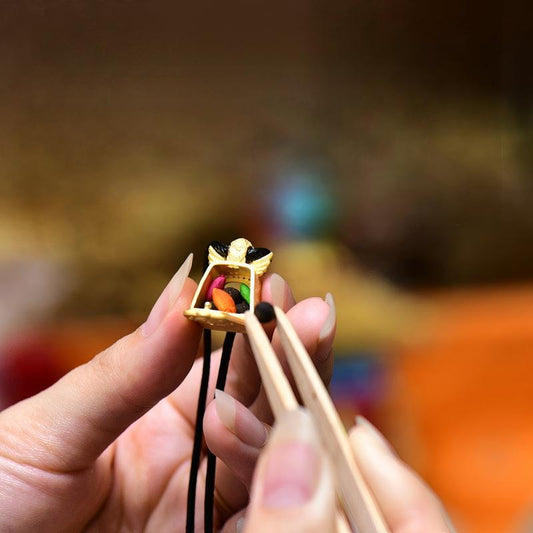 Tibetan Buddhist Jewelry Culture: A handmade sterling silver black gold Garuda Gau box pendant, showcasing sacred Buddhist jewelry art and powerful protection symbols.