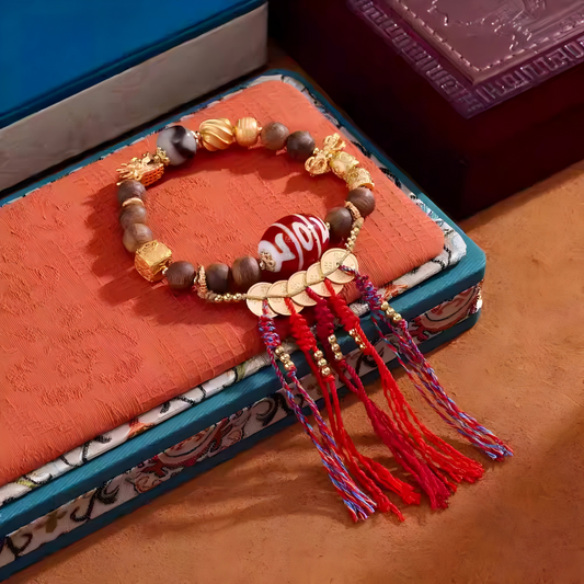 Tibetan Buddhist handmade green Qinan Treasure King Three-Eye Lama bracelet, a lucky charm bracelet promoting wealth, protection, and mindfulness.