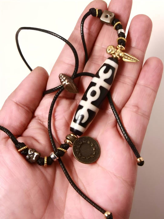 Handmade Agate Tianzhu paired with TianTie and Water Waves Daro design, symbolizing harmony and spiritual wealth in Tibetan Jewelry Art.