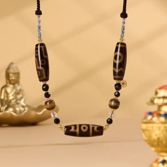 Authentic handmade ivory yellow agate multi-totem Dzi necklace, showcasing jewelry art and Tibetan Buddhist Jewelry Culture.