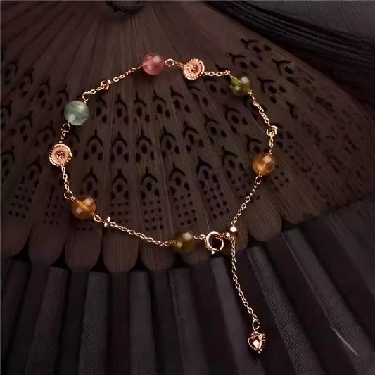 Handmade Tibetan silver bracelet with rose gold plating and tourmaline beads, sweet and delicate design, perfect for women and layering with other bracelets.