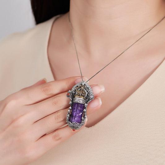 Handcrafted Tibetan Buddhist Manjushri pendant with purple charoite and S925 silver copper, sacred jewelry art symbolizing wisdom, protection, and peace.