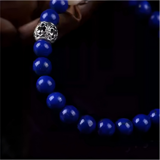 Handcrafted Tibetan silver bracelet with fine Lapis Lazuli beads, minimalist vintage design, elegant spiritual accessory for women’s daily wear.