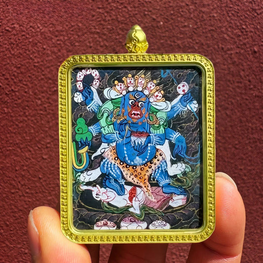 Hand-painted Tibetan Buddhist Six-Armed Mahakala small Thangka Gau box pendant, handcrafted jewelry art symbolizing protection, power, and spiritual strength.