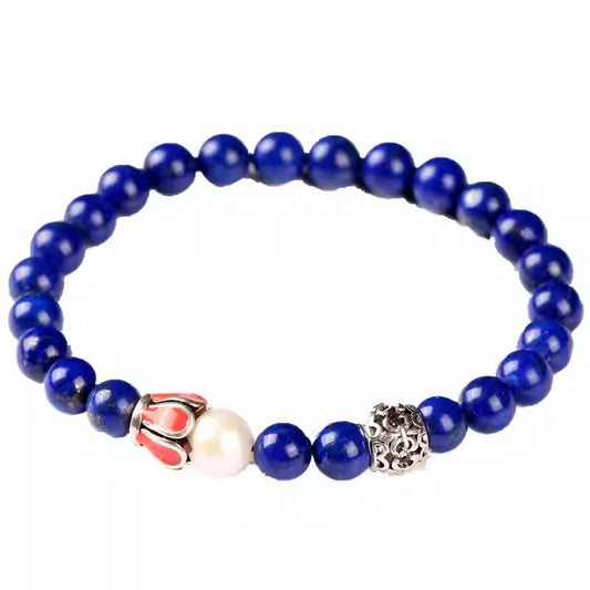 Handmade Tibetan silver bracelet featuring royal blue Lapis Lazuli, delicate and minimalist, perfect for stylish women and spiritual energy.