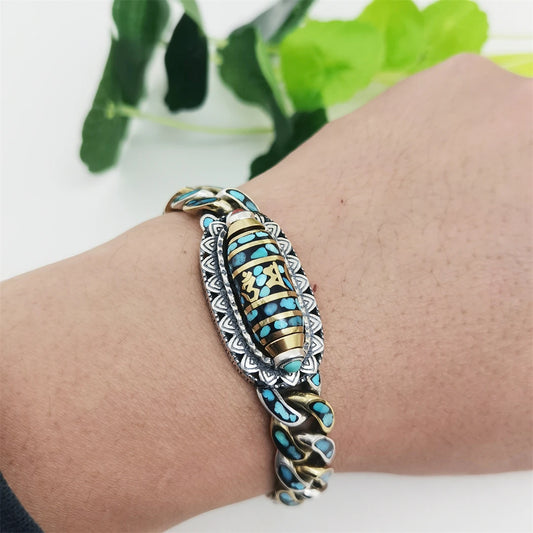 Handcrafted silver Nine Eye bracelet, symbolizing spiritual protection and Tibetan Buddhist culture, with intricate handmade designs for a unique jewelry piece.