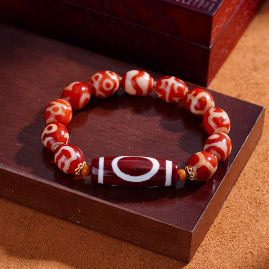 Tibetan Buddhist handmade red mutton multi-gem bracelet, designed as a lucky charm for men and women, promoting positive energy and prosperity.