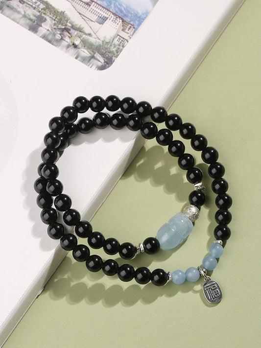 Tibetan Buddhist Jewelry Culture: Handmade Obsidian Aquamarine Pi Xiu Multi-Circle Bracelet combining protection with abundance energy