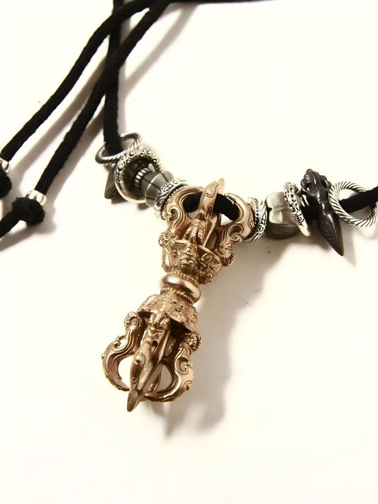 This Tibetan Buddhist jewelry features a Pala Vajra small edition design with dual respect, showing oxidized antique effects and defects. Hand-painted and handcrafted, it embodies the unique artistic charm of Tibetan Buddhist culture.