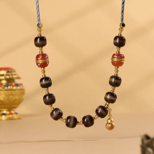 Purely handmade single-line Dzi bead necklace with meticulous spiritual art, reflecting the heritage of Tibetan Buddhist Jewelry Culture jewelry art.