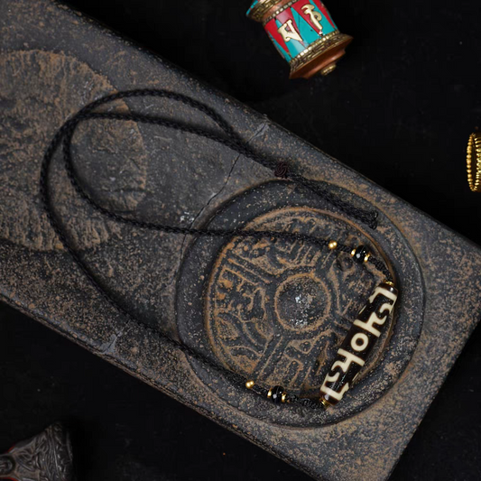 Purely handmade nine-eye Dzi pendant, reflecting the heritage of Tibetan Buddhist Jewelry Culture jewelry art.