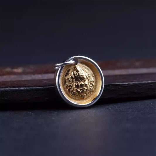 Purely handmade silver gold-plated Tibetan talisman charm, reflecting the heritage of Tibetan Buddhist Jewelry Culture jewelry art.