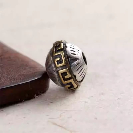 Handmade silver inlaid copper lotus saucer spacer bead, showcasing Tibetan Buddhist Jewelry Culture and jewelry art.