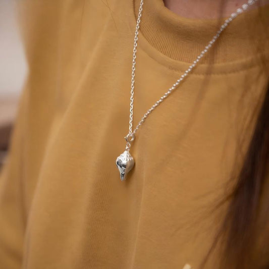 Traditional Conch Shell silver gold-plated counter, handmade for premium spiritual Jewelry art and peace.