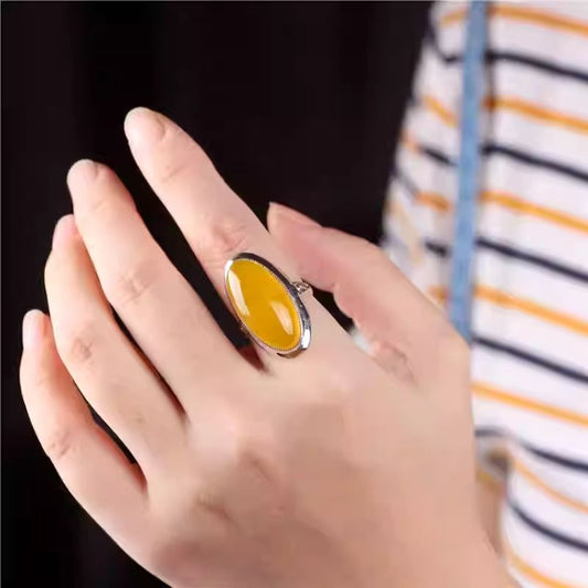 Artisan-crafted Yellow Agate silver ring, combining Tibetan Buddhist Jewelry Culture energy with bold Jewelry art.