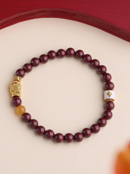 Admiration Joy cinnabar bracelet with quartzite jade, featuring traditional Tibetan Buddhist jewelry art for attracting love and happiness