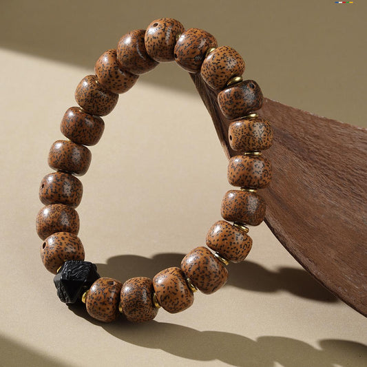 Star Moon Bodhi and Obsidian bracelet in Tibetan Buddhist jewelry art, combining enlightenment energy with protective properties in hand-painted design.