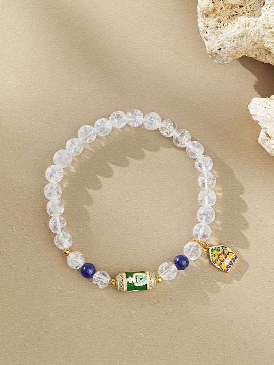 Detail of Pure Handmade Crystal and Lapis Lazuli Bracelet. Shows artisan carefully selecting natural crystal and lapis lazuli, hand-polishing and stringing process, ensuring each gemstone's energy integrity and aesthetic appeal.