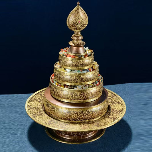 Tibetan Buddhist sacrificial implements culture: A majestic copper mandala set featuring Eight Auspicious Symbols and Seven Gemstones, used for ritual universe offerings and merit accumulation.