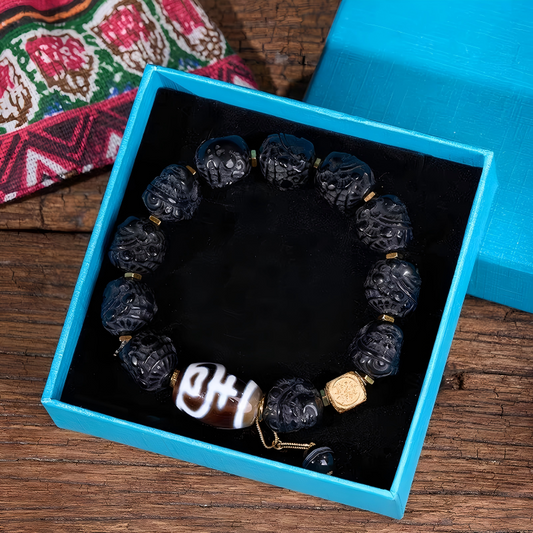 Authentic black wealth god Dzi bead bracelet representing Buddhist sacrificial items art within the Tibetan Buddhist sacrificial implements culture. Pure handmade natural agate jewelry.
