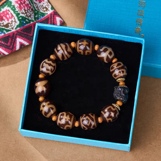 Tibetan Buddhist sacrificial implements culture Drolma Lha ivory yellow Darlok multi-totem Dzi bracelet. Handcrafted from natural agate as a piece of Buddhist sacrificial items art.