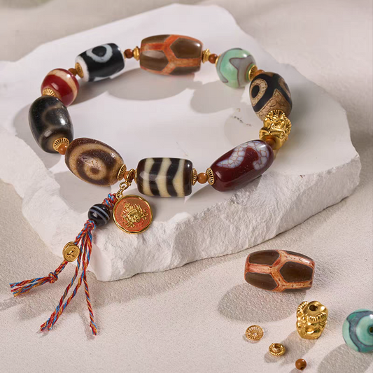 Tibetan Buddhist sacrificial implements culture Darlok multi-totem Dzi bead bracelet. Handcrafted from natural agate as a piece of Buddhist sacrificial items art.