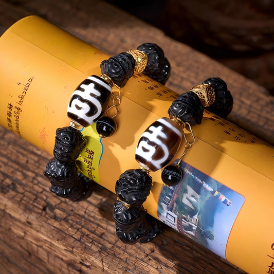 Tibetan Buddhist sacrificial implements culture black and white treasure vase and lotus heart Dzi bead bracelet. Handcrafted from natural agate as a piece of Buddhist sacrificial items art.