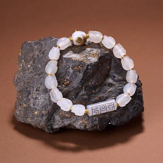 Authentic Tibetan six-eyed Dzi bead bracelet, a centerpiece of Buddhist sacrificial items art within the broader Tibetan Buddhist sacrificial implements culture. Pure handmade natural agate.