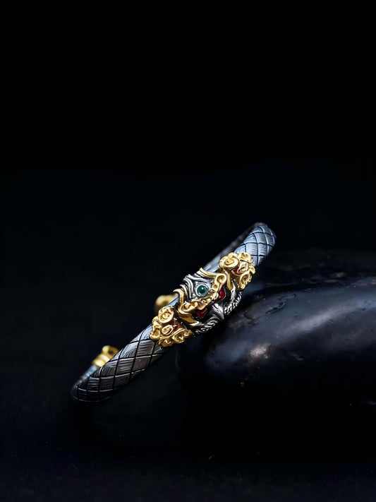 Vintage style Tibetan gold amulet bangle inspired by Buddhist sacrificial items art, perfect for meditation practitioners seeking an authentic spiritual accessory.