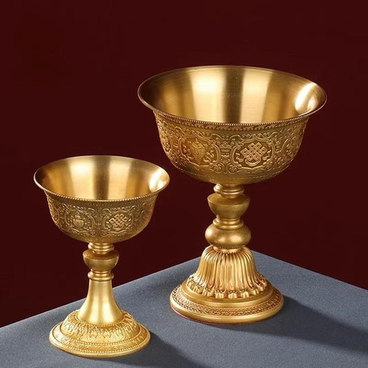Exquisite Buddhist sacrificial items art piece, a pure copper candle holder featuring intricate engravings, reflecting the sacred heritage of Tibetan Buddhist sacrificial implements culture.